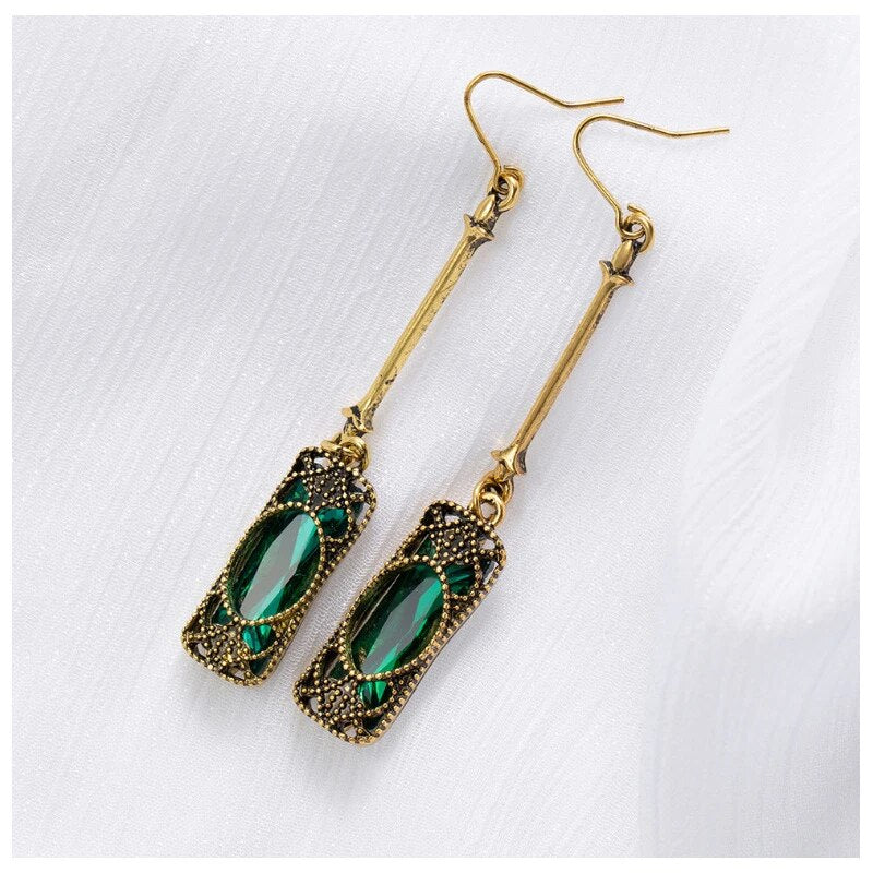 Gold Earrings with Green Lantern Pendant