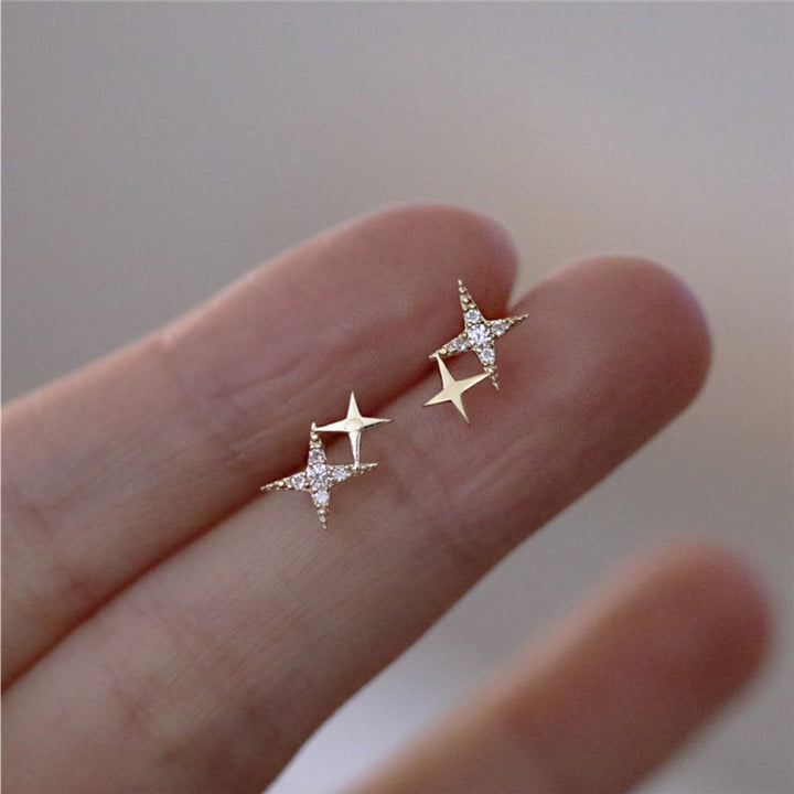 Gold Star-Shaped Earrings Adorned with Zirconia