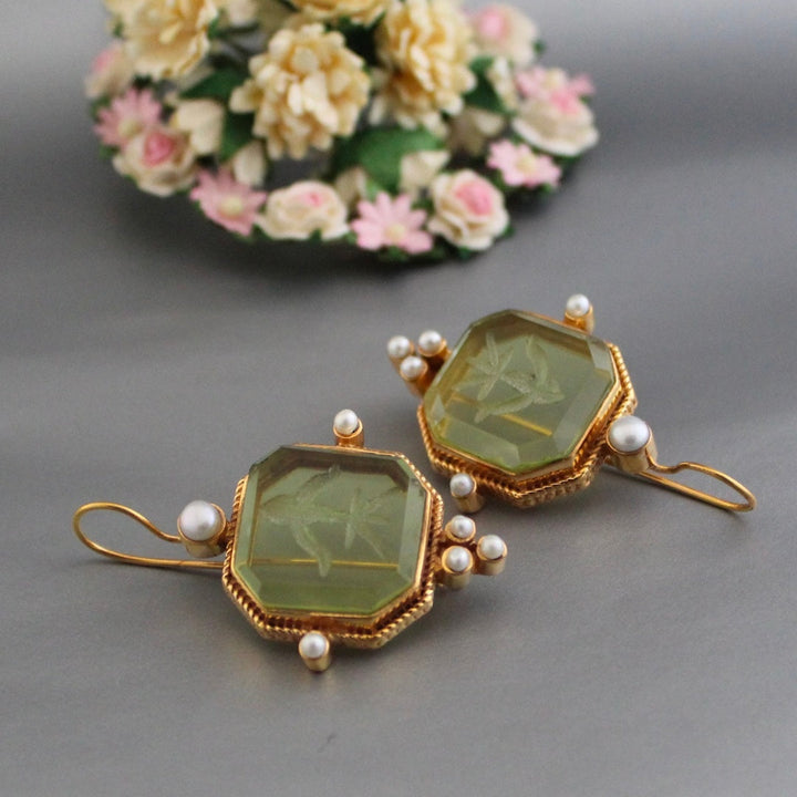 Vintage earrings with green pearls