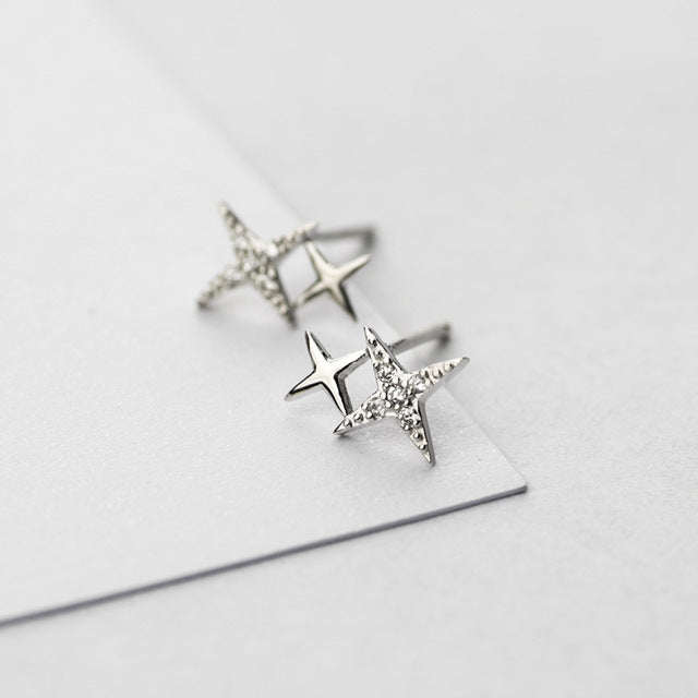 Gold Star-Shaped Earrings Adorned with Zirconia