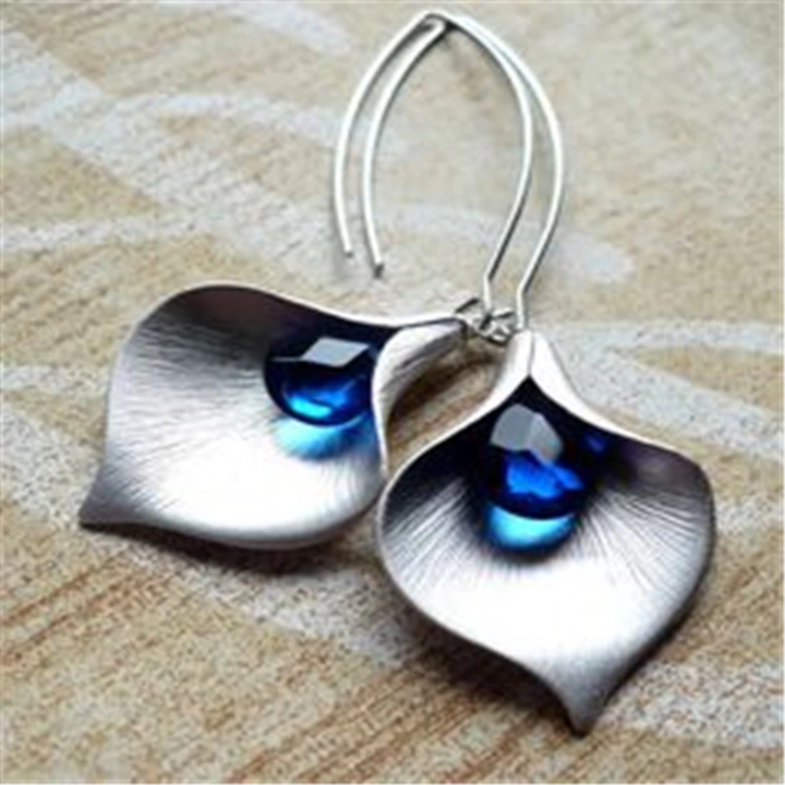 Silver earrings with blue stone