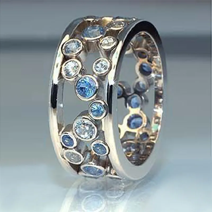 Silver Ring Set with Embedded Zircon