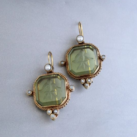 Vintage earrings with green pearls